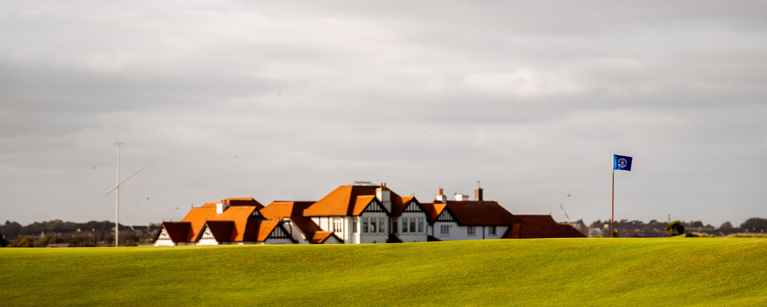 Green and clubhouse at Portmarnock Golf Club