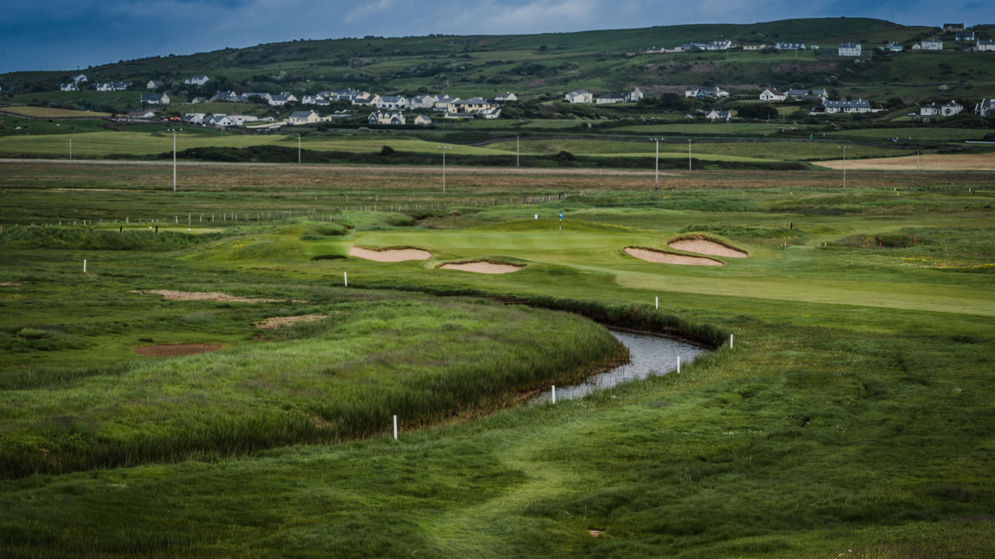 Dough Castle beside a green at Lahinch Golf Club