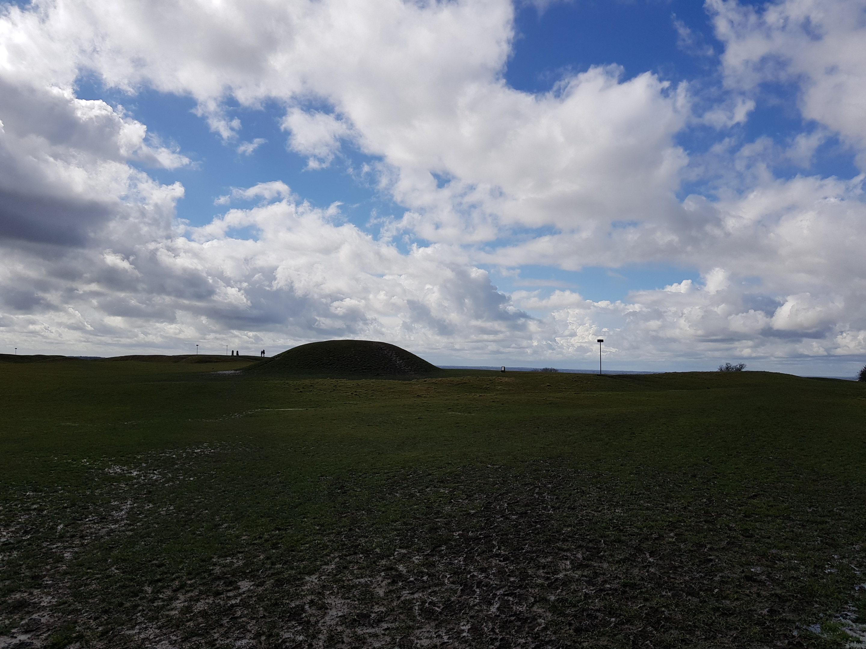 The grassed earthworks and standing stone on the Hill of Tara, County Meath