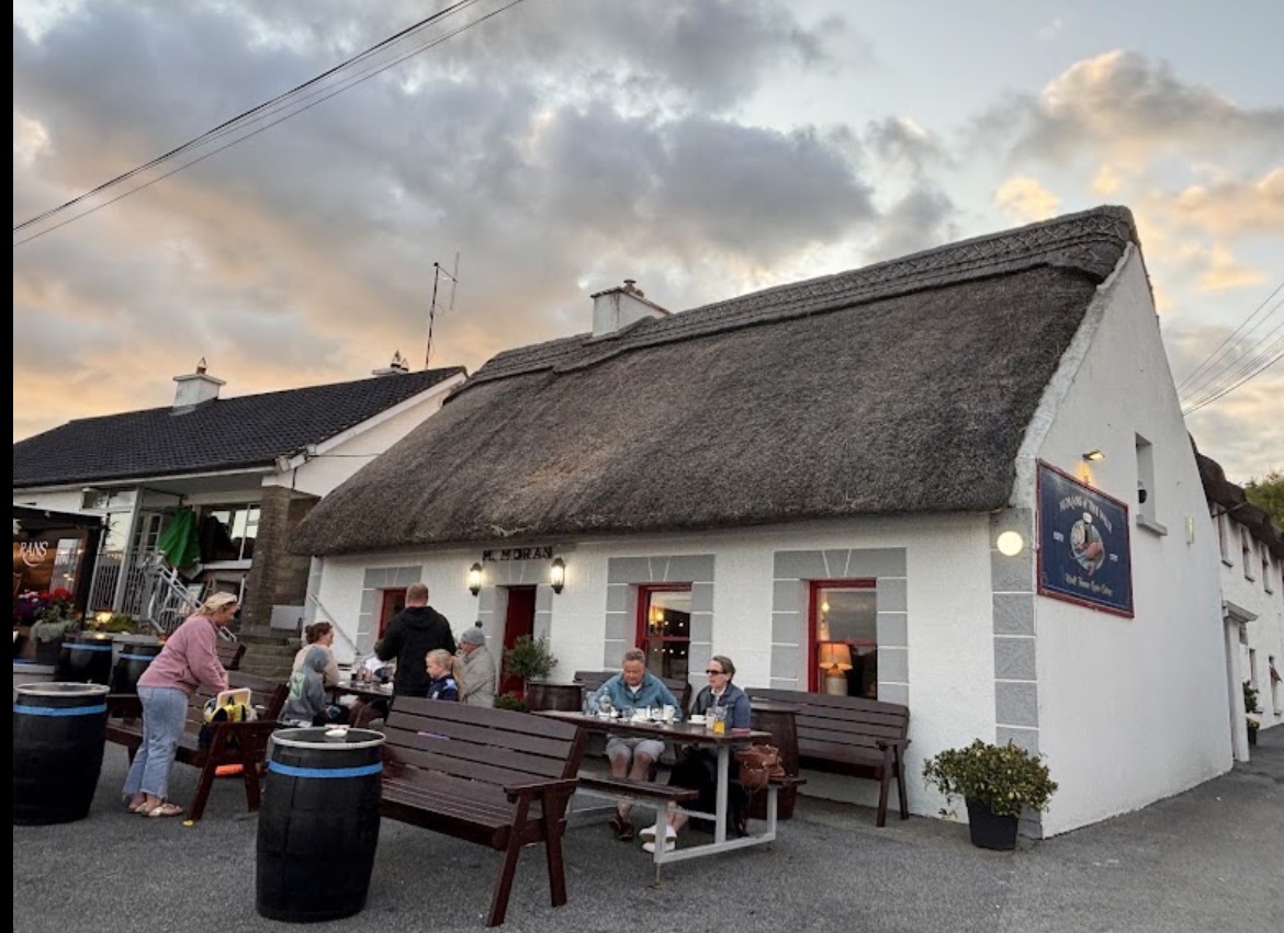 Moran's Oyster Cottage, the half dozen flats at the pier