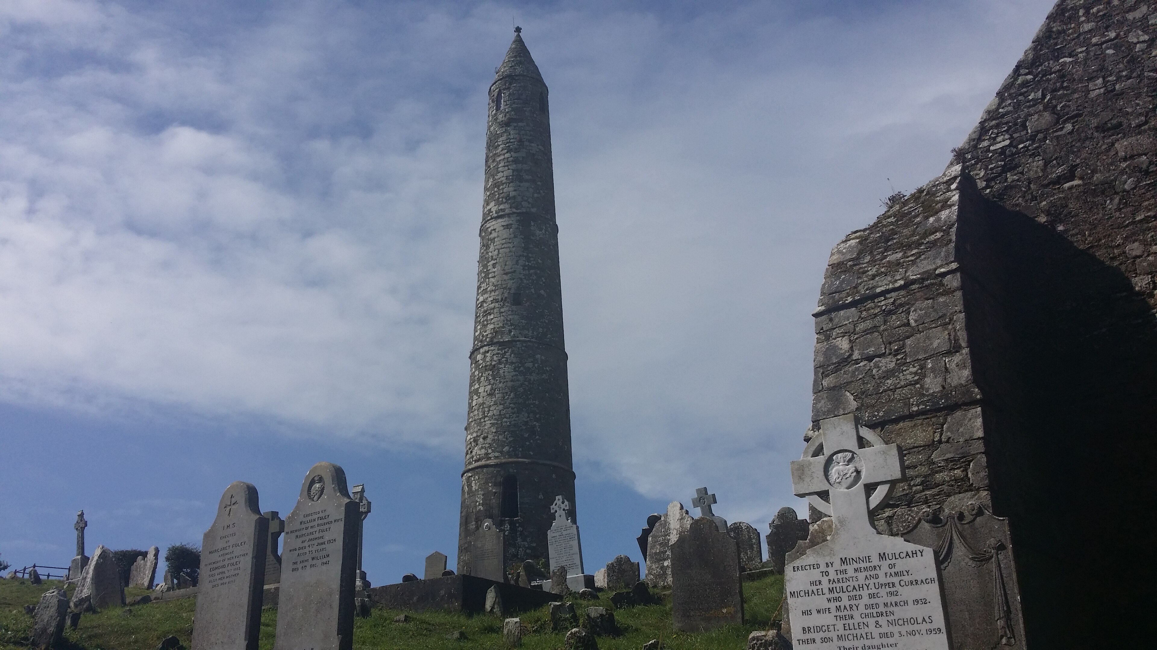 St Declan's round tower and cathedral ruin on the headland above Ardmore, County Waterford