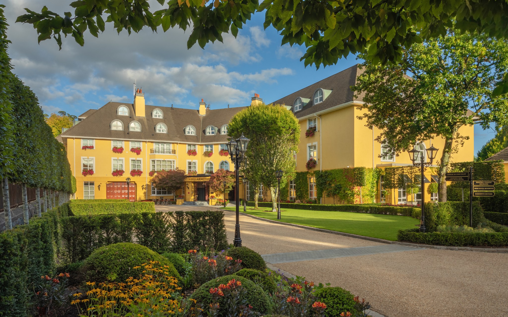 Front exterior and gardens of The Killarney Park Hotel in Killarney, County Kerry