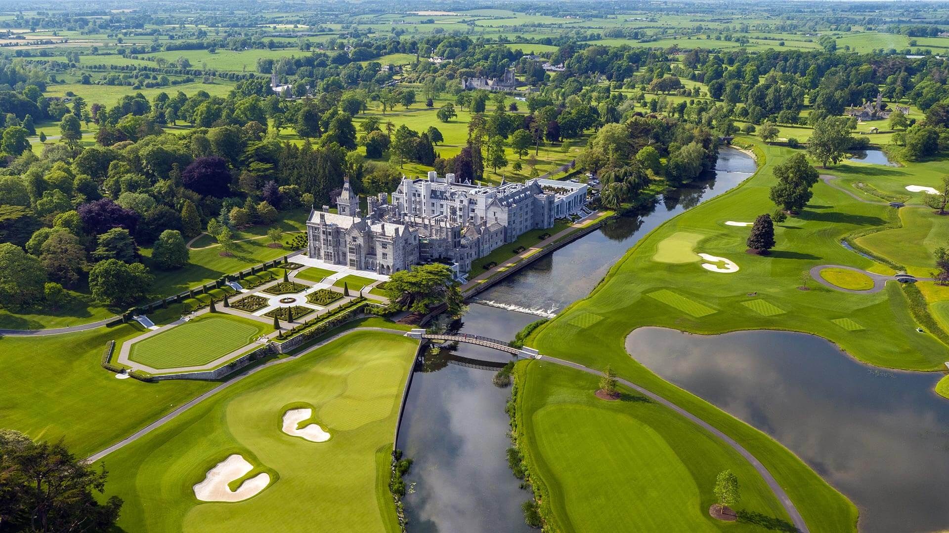 Adare Manor seen from the air across its parkland