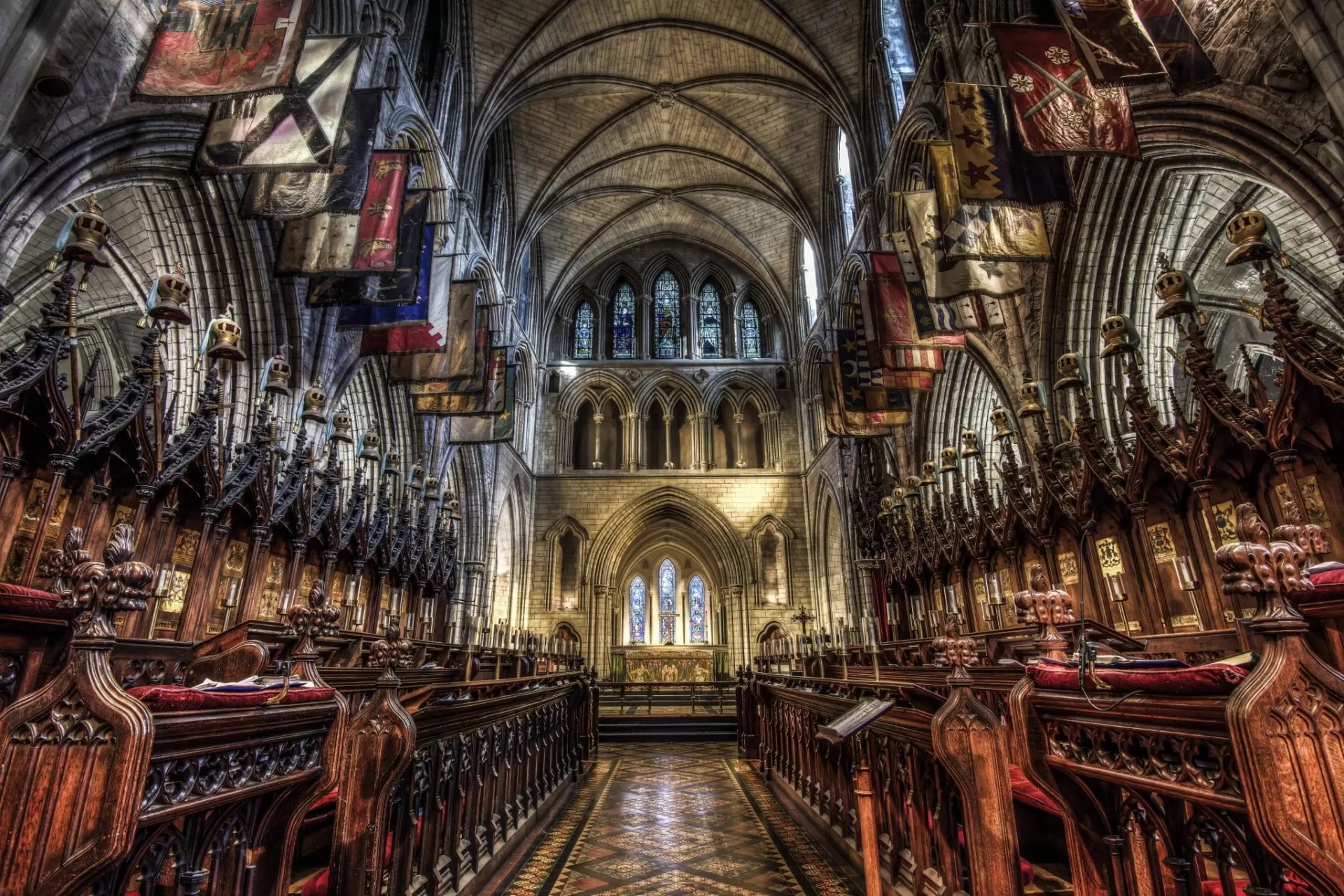 The choir of St Patrick's Cathedral, with carved stalls and the banners of the Knights of St Patrick