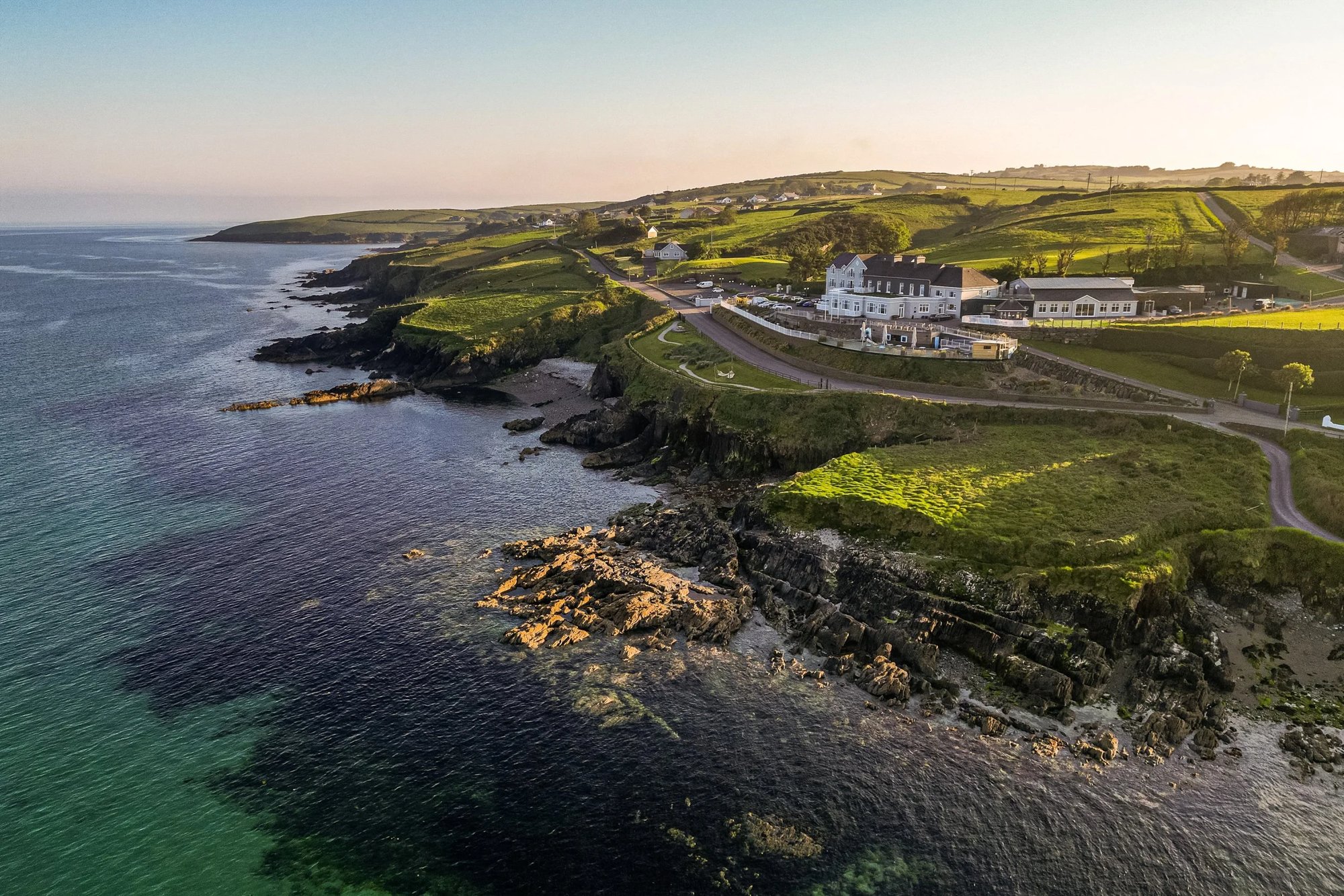 Dunmore House on the headland above Clonakilty Bay, seen from the air