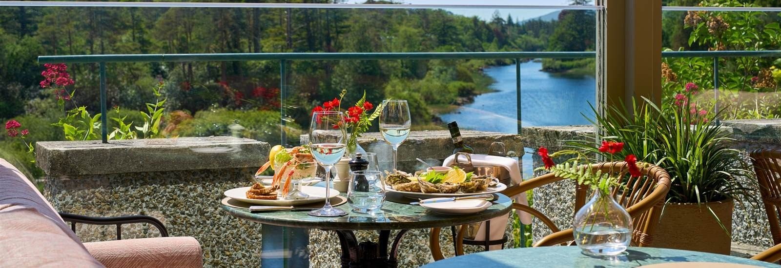 A table overlooking the river at Owenmore, Ballynahinch Castle