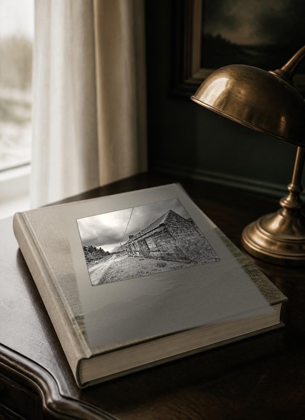 Cover of the bound printed edition N° 02, The 10-Day Ireland Itinerary, cover line “The Long Way Round”, from The Ireland Edit. The linen-bound volume photographed as a physical book, with a documentary photograph of The Inagh Valley, Connemara, County Galway tipped into the front board.