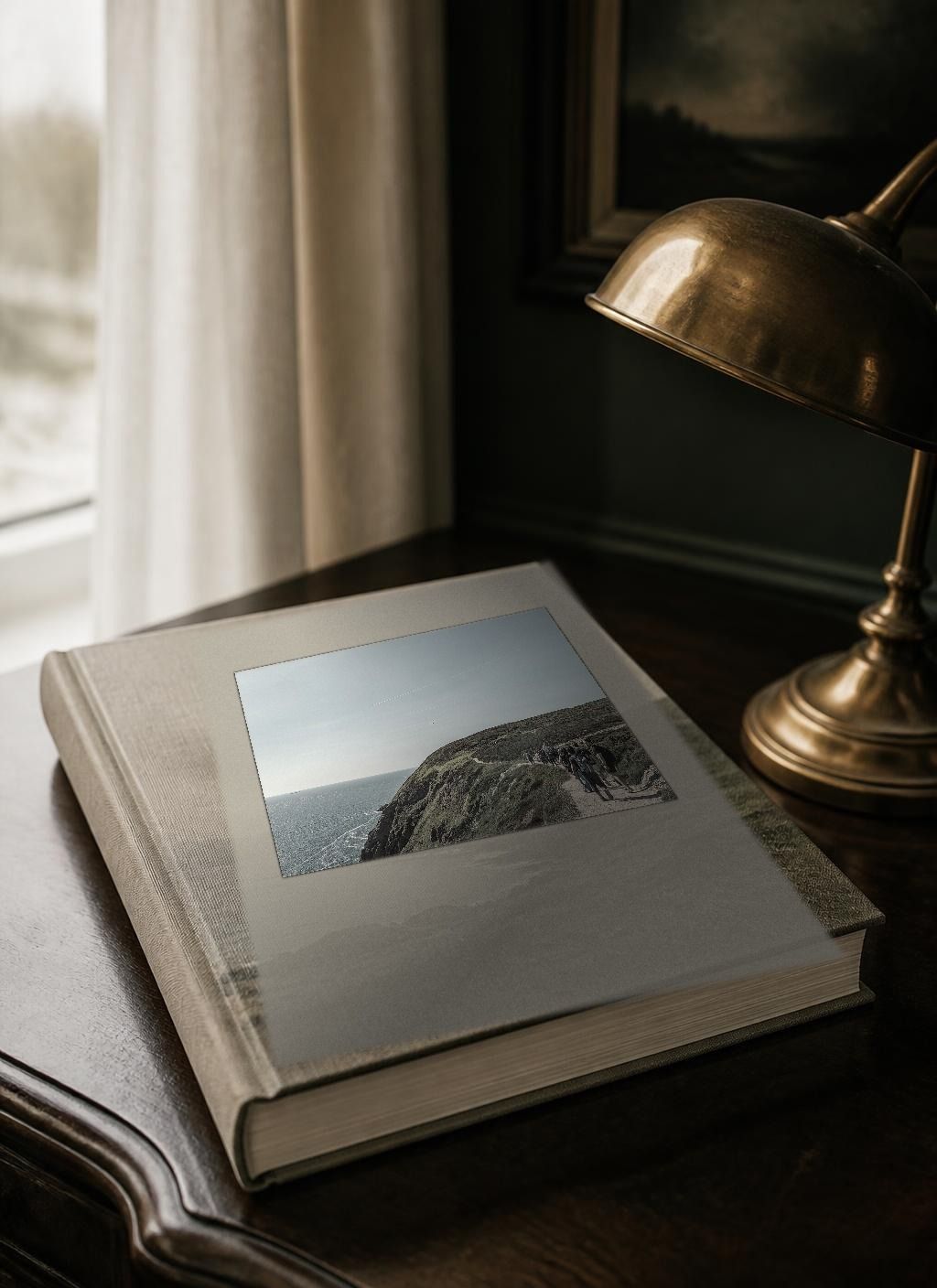 Cover of the bound printed edition N° 08, The Ireland Family Itinerary (Older Kids), cover line “An Active Week”, from The Ireland Edit. The linen-bound volume photographed as a physical book, with a documentary photograph of Howth Head, County Dublin tipped into the front board.
