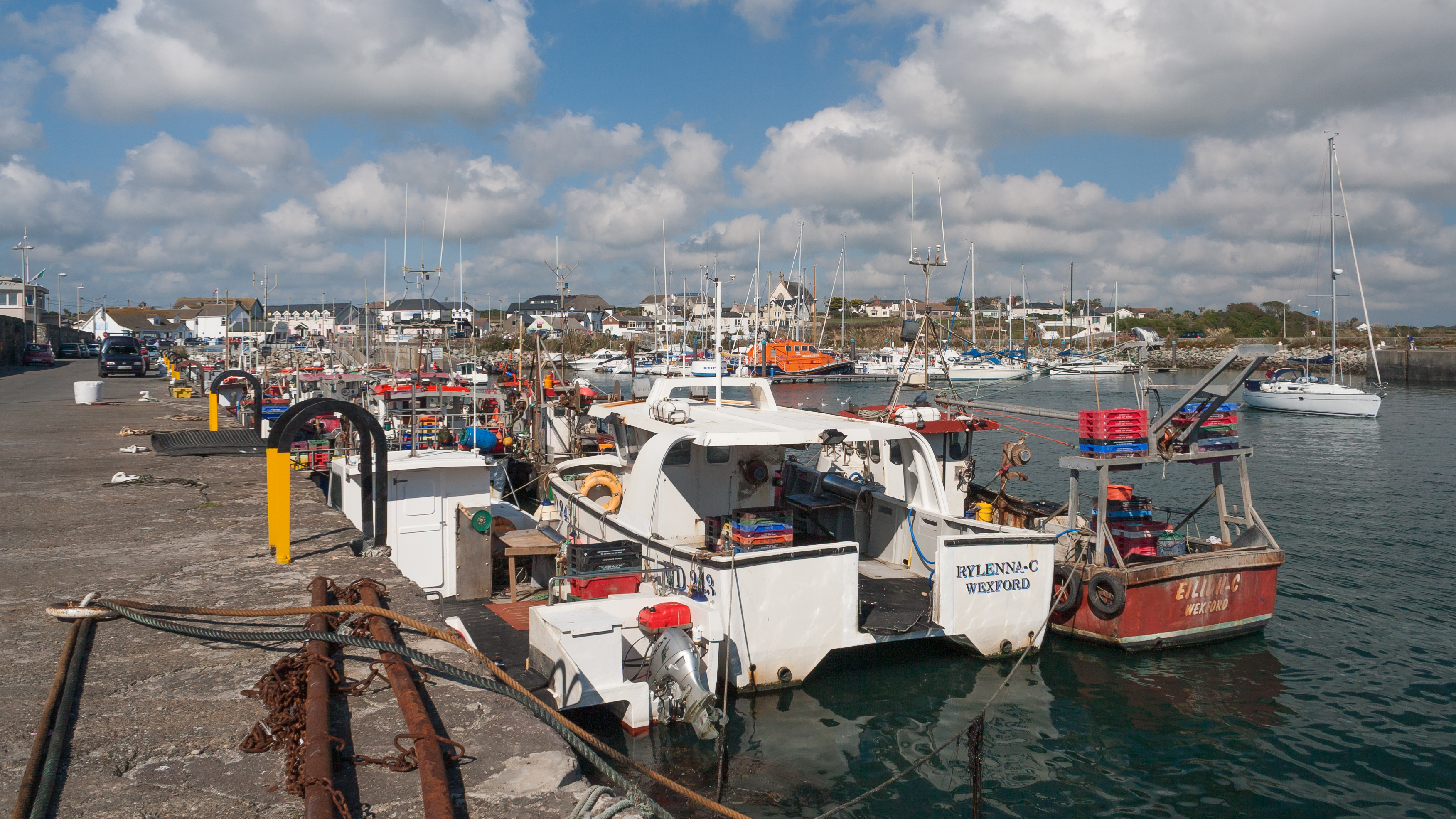 Fishing boats and harbour buildings at Kilmore Quay, County Wexford