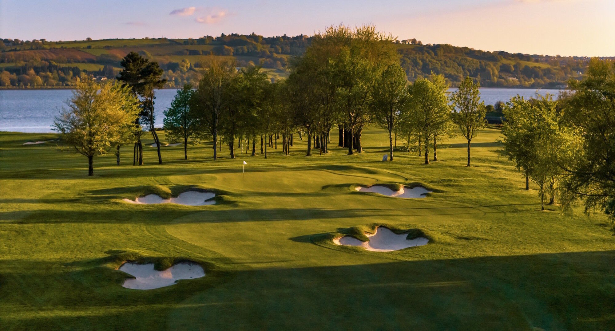 Fairway and bunkers above the harbour at Cork Golf Club
